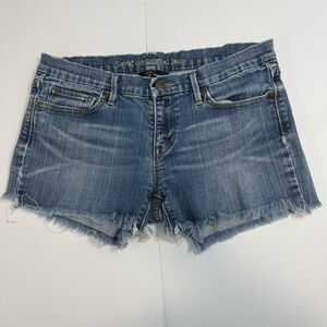 Vintage Levi's size 9 Light Blue Frayed Hem Denim Shorts vacation beach summer